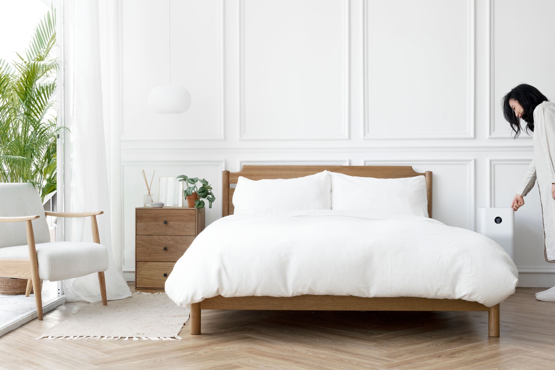 Bright, tidy bedroom with a made bed — bed bug control in West Jordan, UT